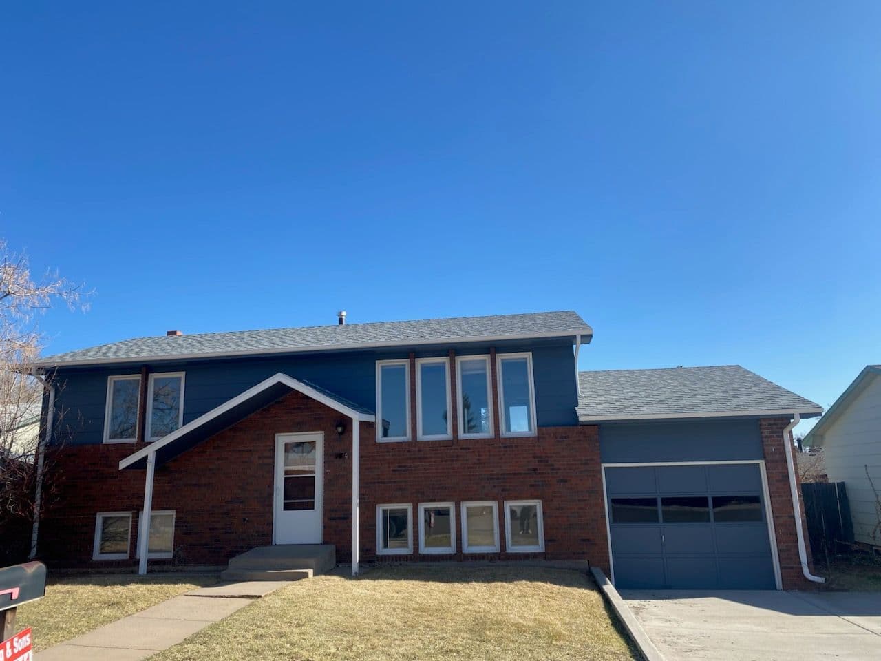 Project Dove Gray Shingle Roof Transformation in Laramie image