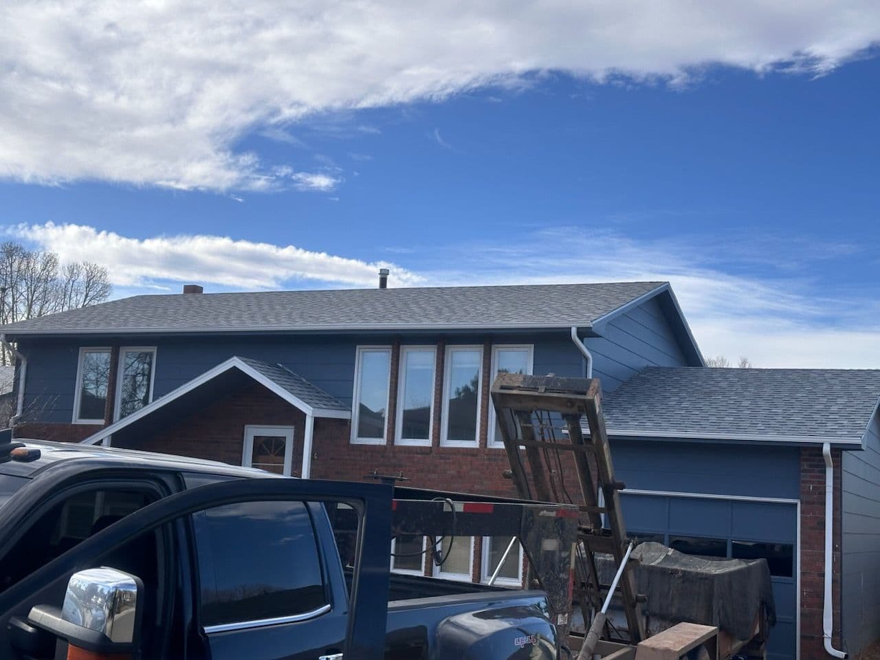 Gallery photos for Dove Gray Shingle Roof Transformation in Laramie: Image #2